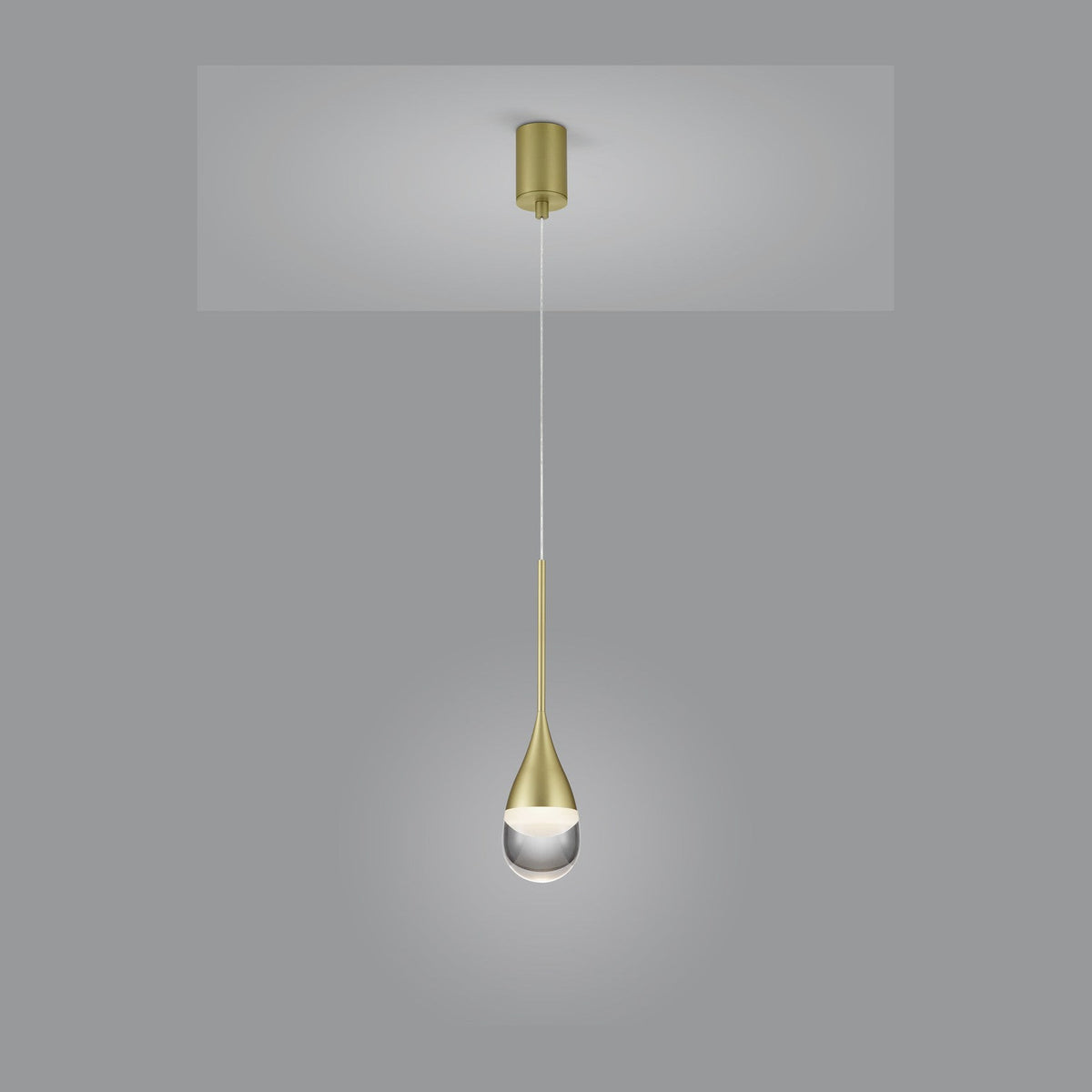 Suspension dorée complète avec rosace et câble sur fond gris clair