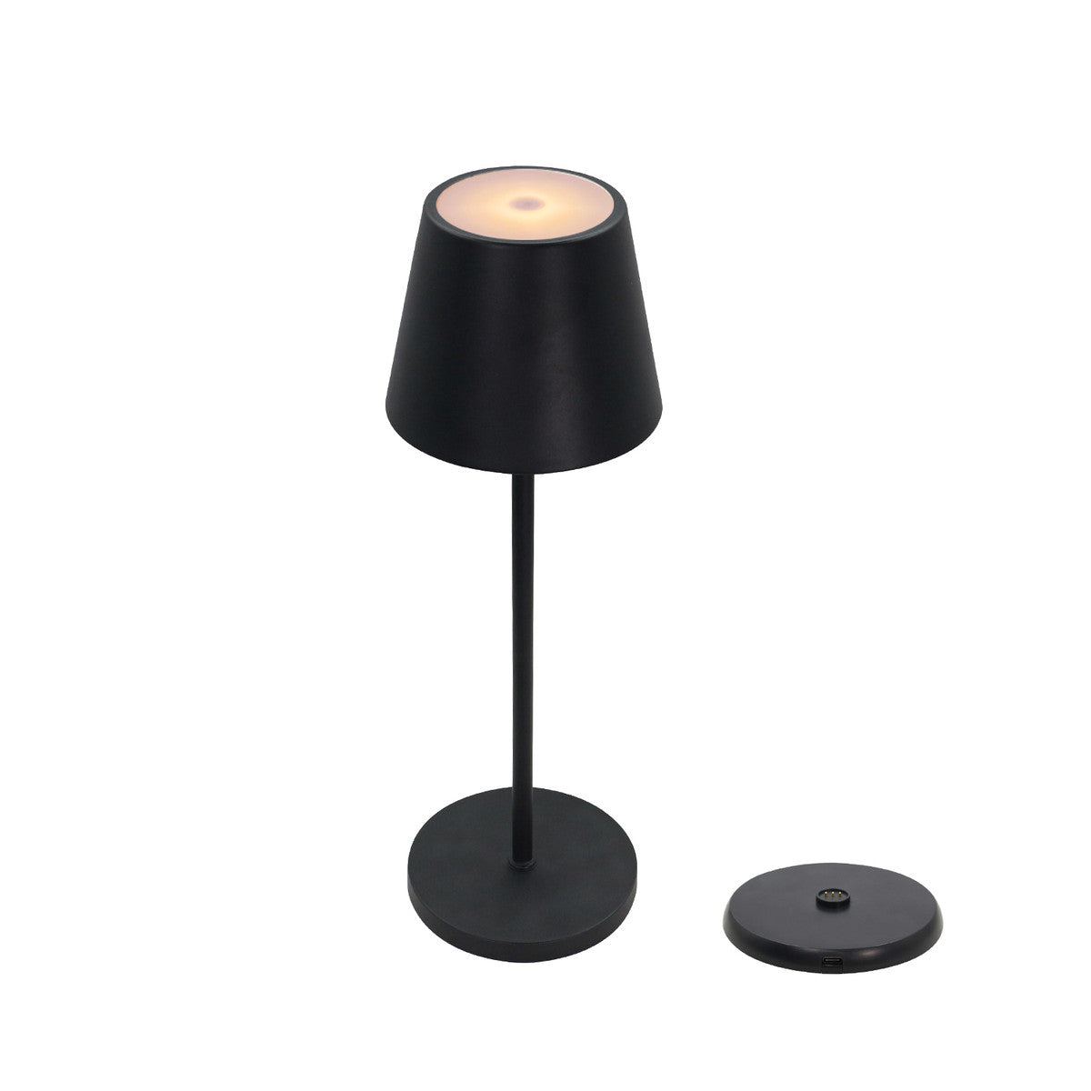 Lampe à poser noire sans fil vue de face, avec sa base de recharge séparée