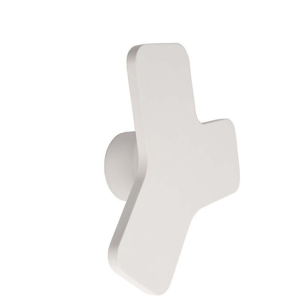 Applique murale blanche asymétrique vue de trois quarts sur fond neutre