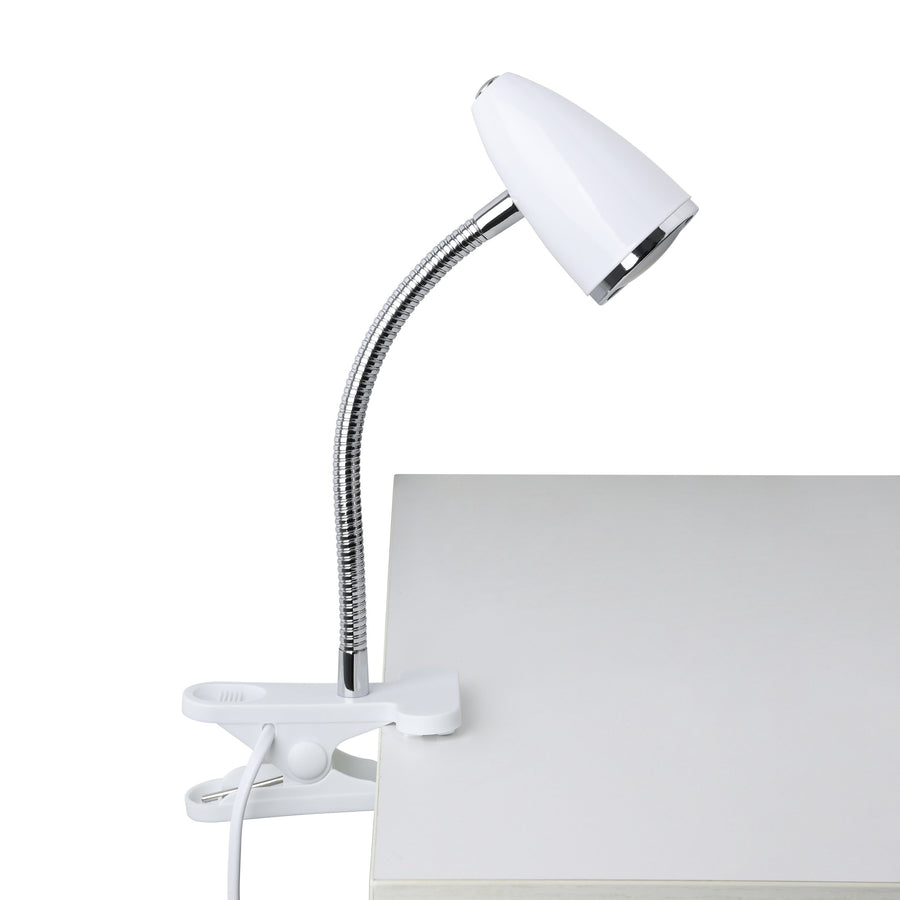 Luminaire blanc clipsé sur un panneau, câble visible et tête orientée vers le haut.