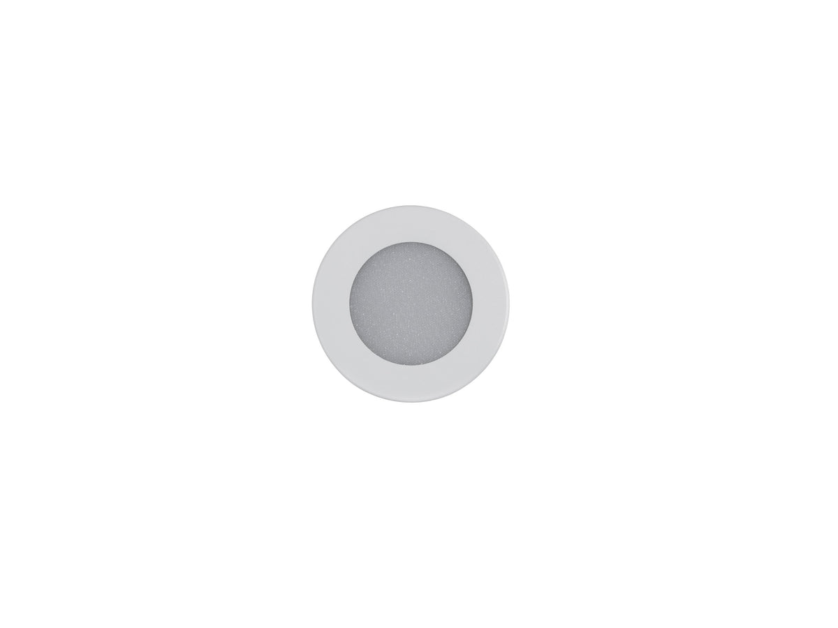 Spot blanc photographié de face sur fond neutre, disque central gris clair