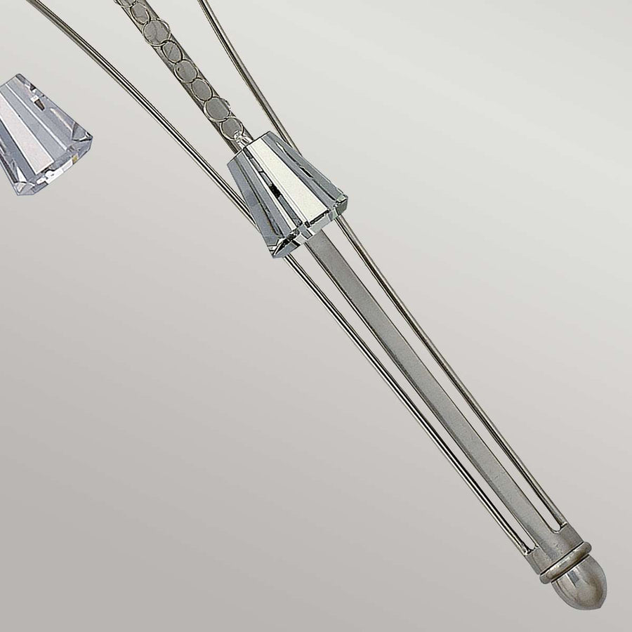 Détail du bras central strié et de son embout arrondi nickel satiné