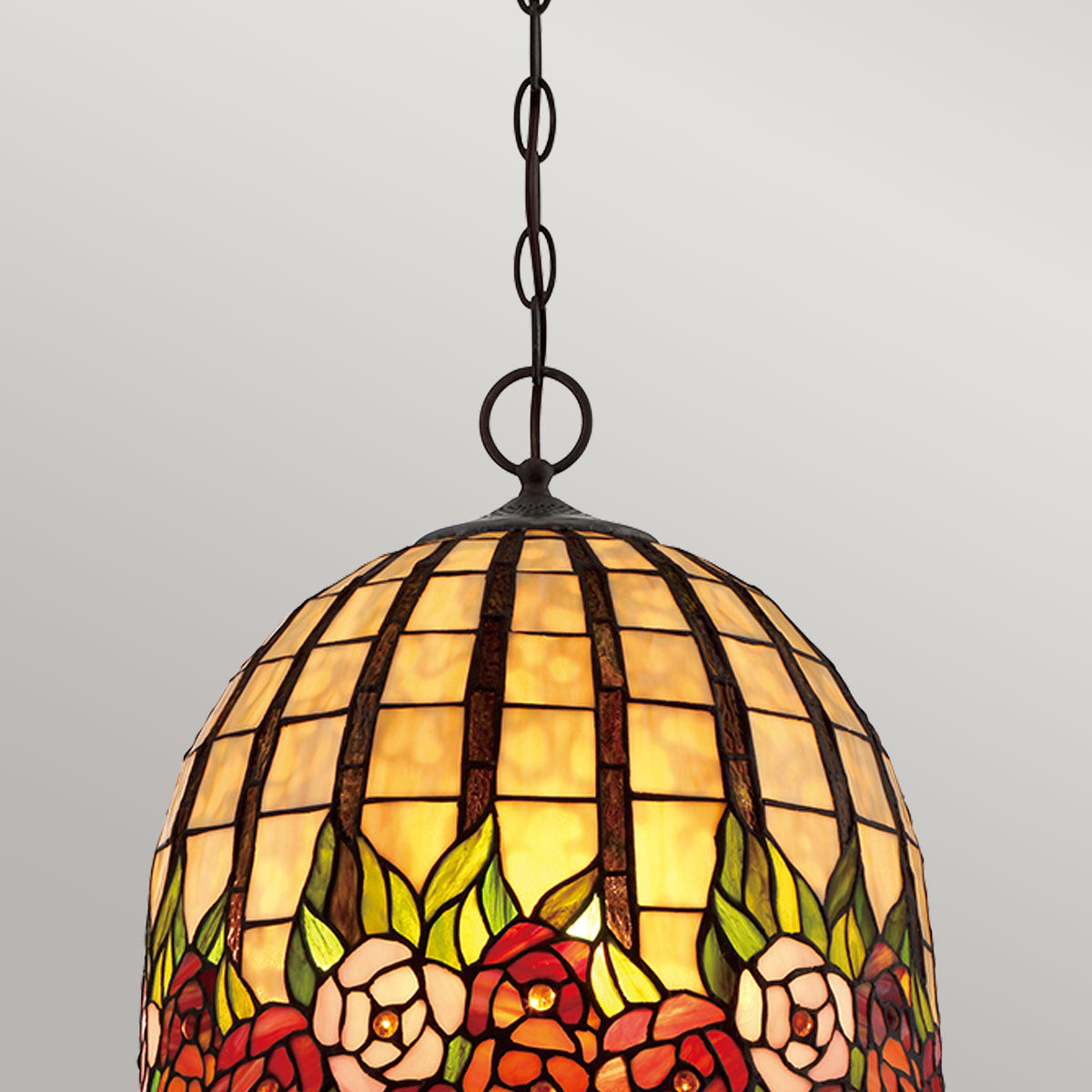 Détail du haut de l'abat-jour, chaîne bronze et verre ambré