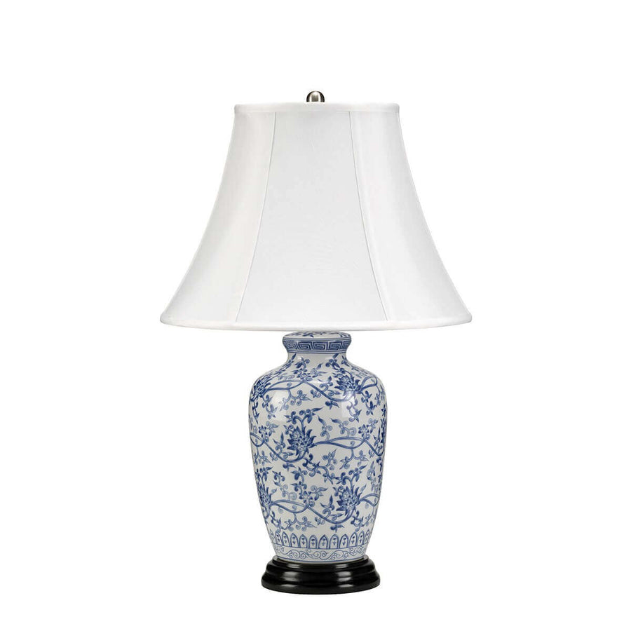 Même lampe présentée de face, mettant en valeur le motif floral bleu du vase.
