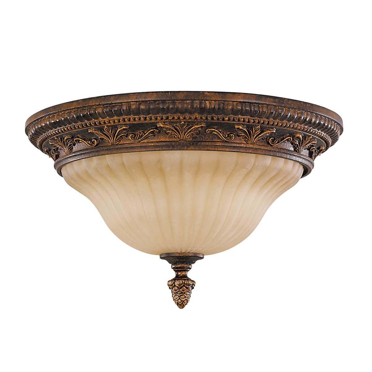 Plafonnier complet de face avec monture bronze ouvragée et vasque en verre strié.