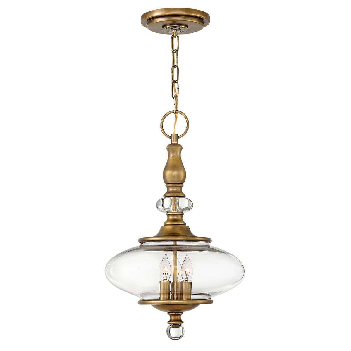 Suspension complète en laiton vieilli avec diffuseur ovale en verre transparent suspendu par une chaîne.