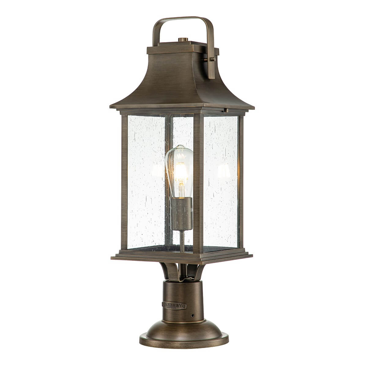 Lampadaire extérieur en bronze avec verre transparent, lanterne rectangulaire et poignée sur le dessus.