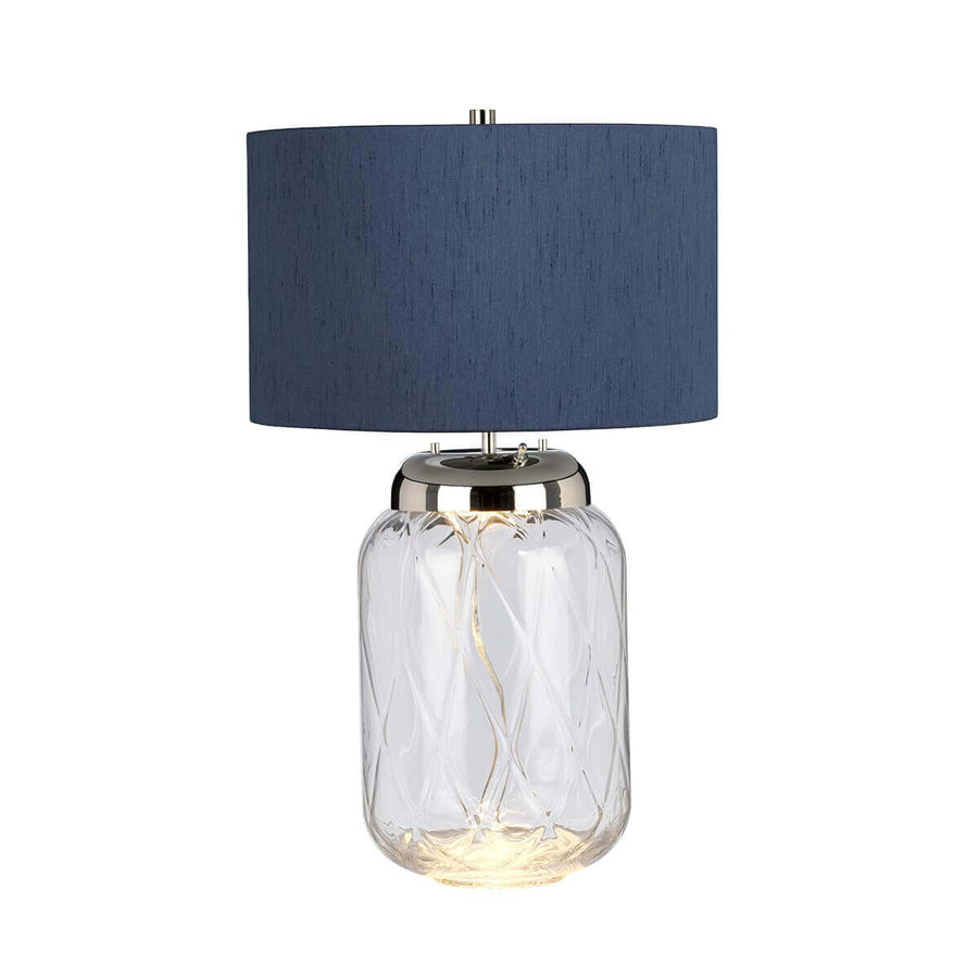 Lampe à poser de face, abat-jour bleu et base en verre transparent