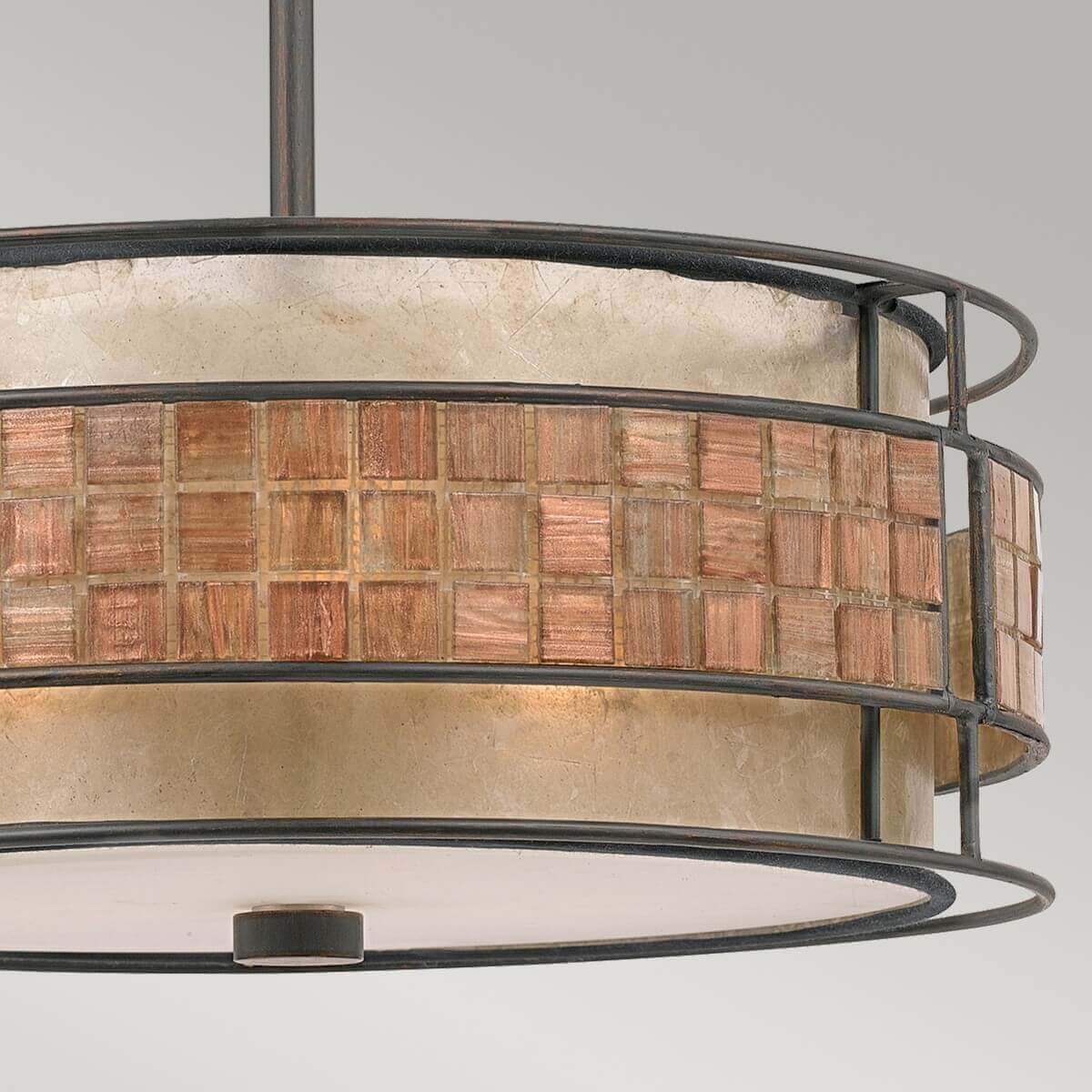 Détail du bandeau mosaïque cuivre et de la cage métallique patinée