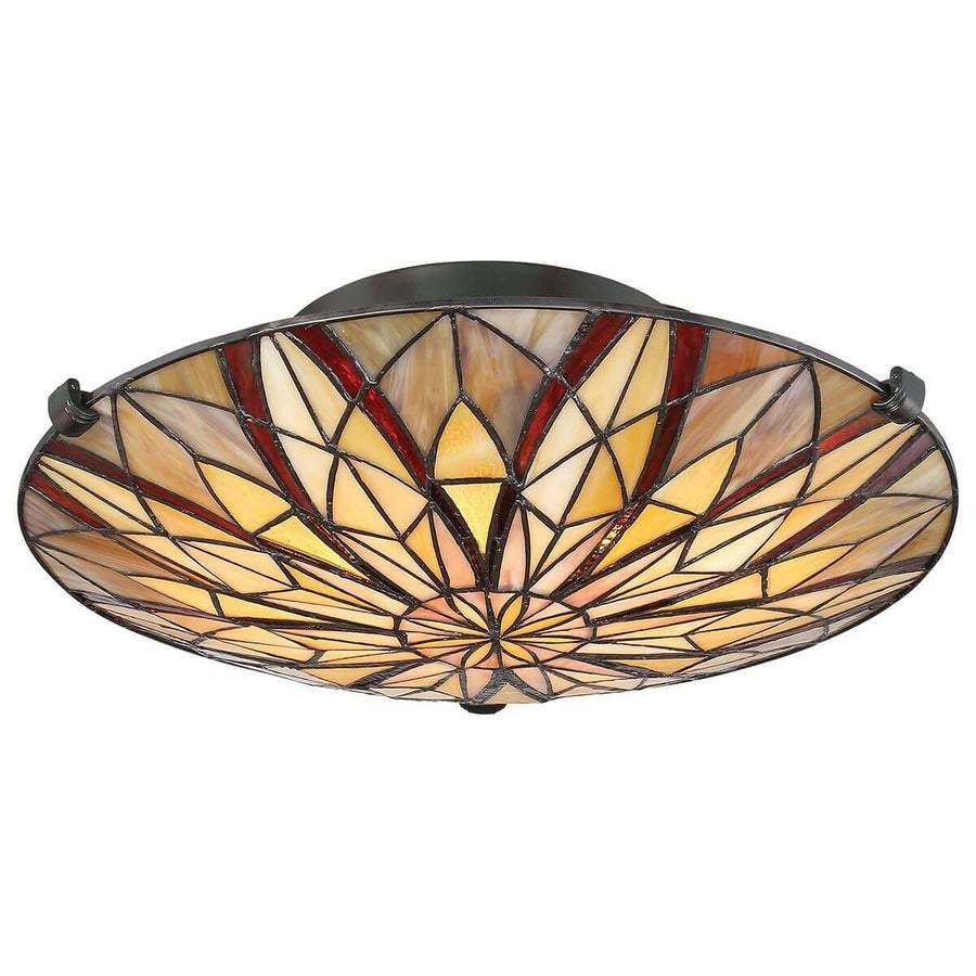 Luminaire allumé de face, mettant en valeur les reflets chauds du verre
