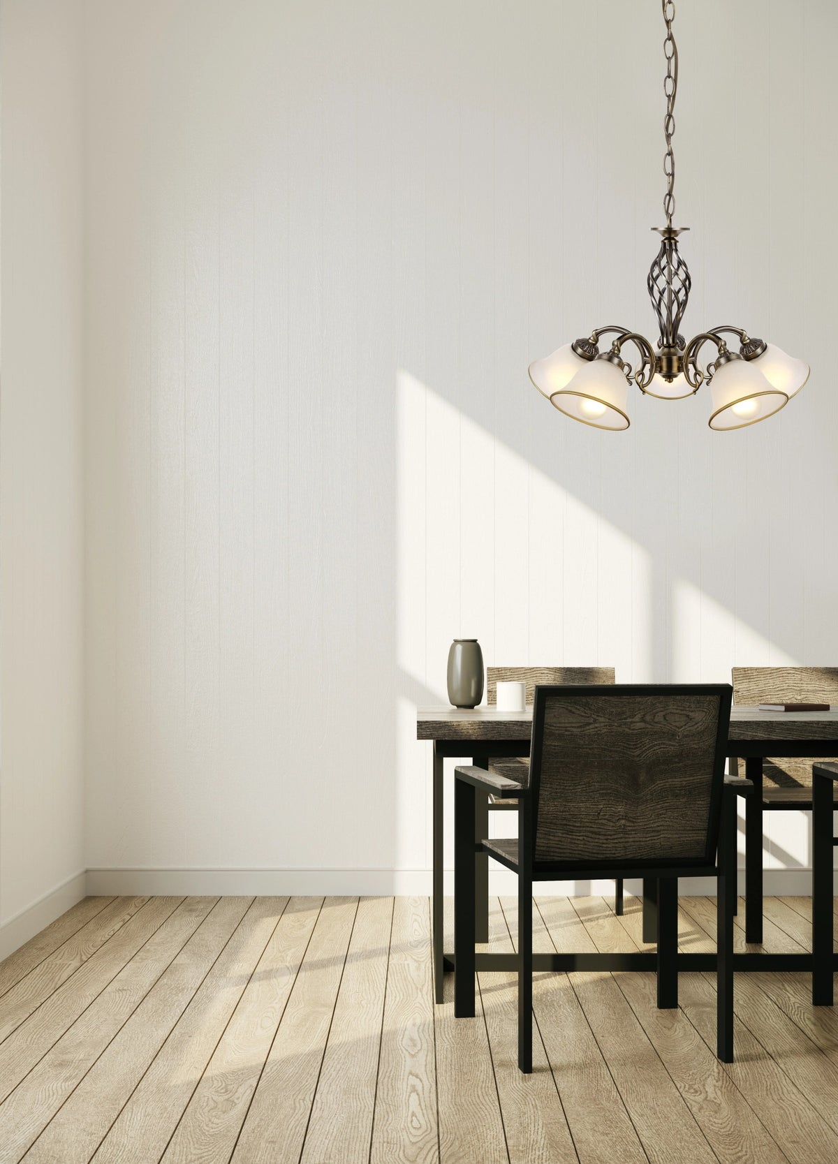 Mise en ambiance dans une salle à manger avec la suspension allumée au-dessus de la table.