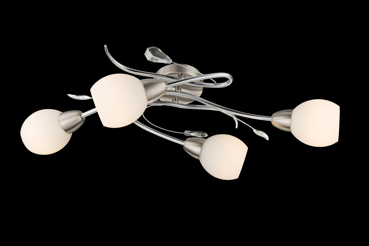 Vue sur fond noir, quatre globes en verre blanc et structure nickel satiné.
