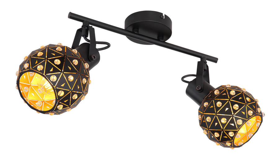 Autre angle du plafonnier, montrant les deux globes ajourés et leur fixation articulée.
