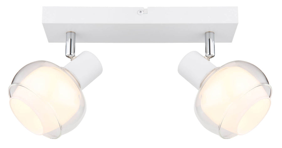 Vue frontale du spot double avec les deux globes allumés et la base rectangulaire blanche.