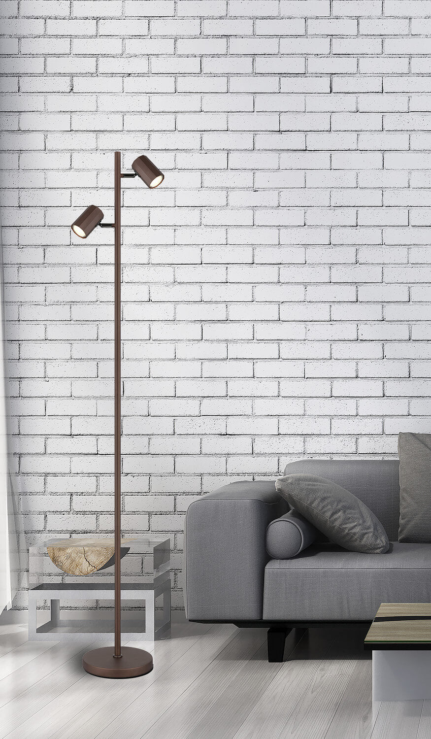 Mise en ambiance du lampadaire dans un salon devant un mur de briques blanches
