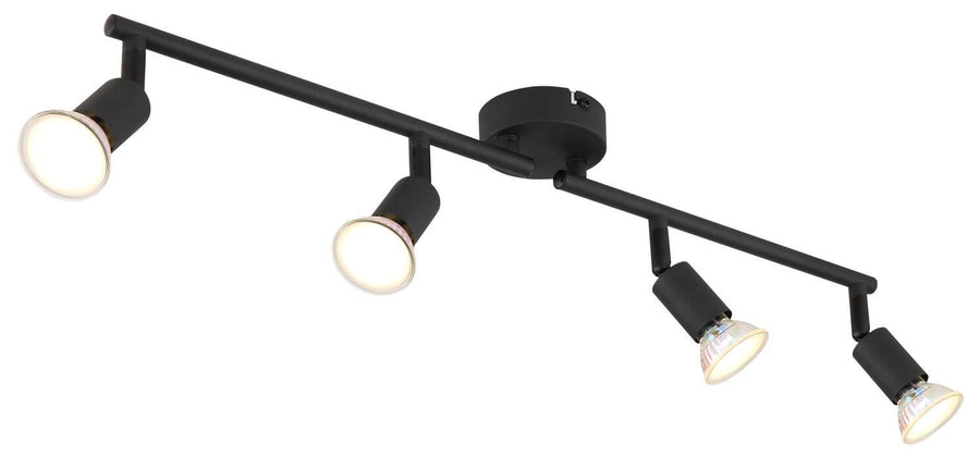 Gros plan sur les projecteurs cylindriques du luminaire noir mat, fond blanc.