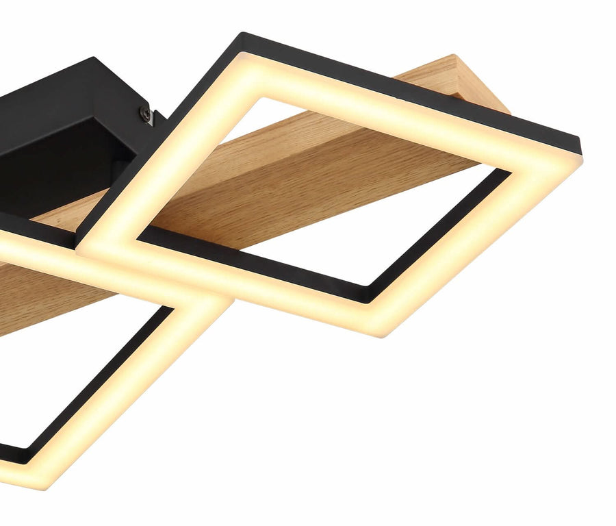Détail de la finition : cadre métallique noir, diffuseur LED et latte en bois clair.