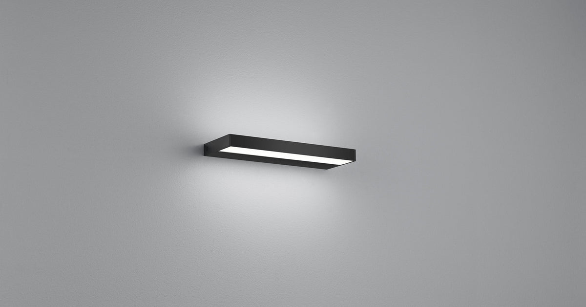 Vue rapprochée du caisson noir diffusant une lumière blanche en dégradé