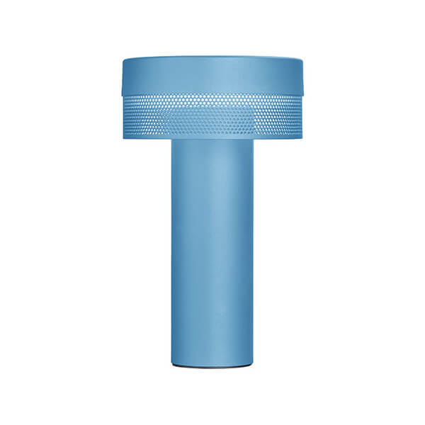 Lampe à poser bleue cylindrique avec bandeau perforé, vue de face sur fond blanc.