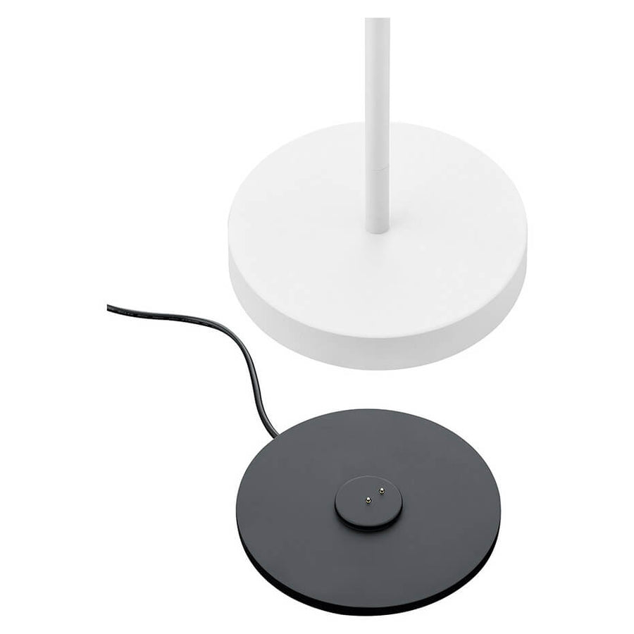 Base ronde blanche et socle noir avec câble d'alimentation.