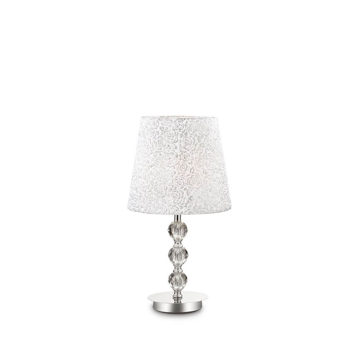 Lampe à poser de face, abat-jour conique à motif floral et pied chromé en verre