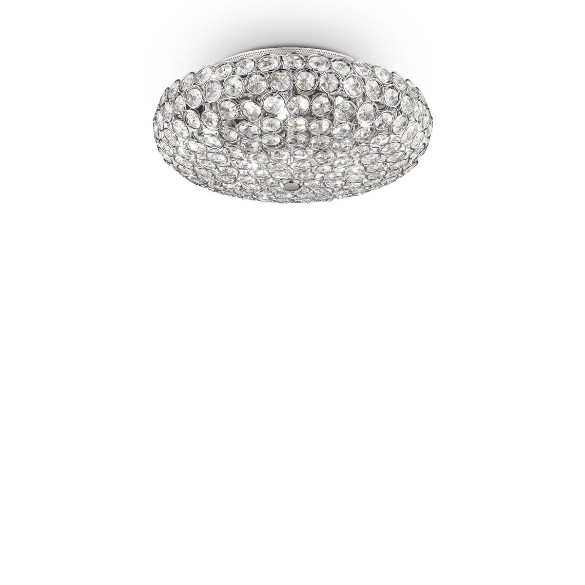 Plafonnier rond chromé entièrement garni de cristaux, vue de face sur fond blanc.