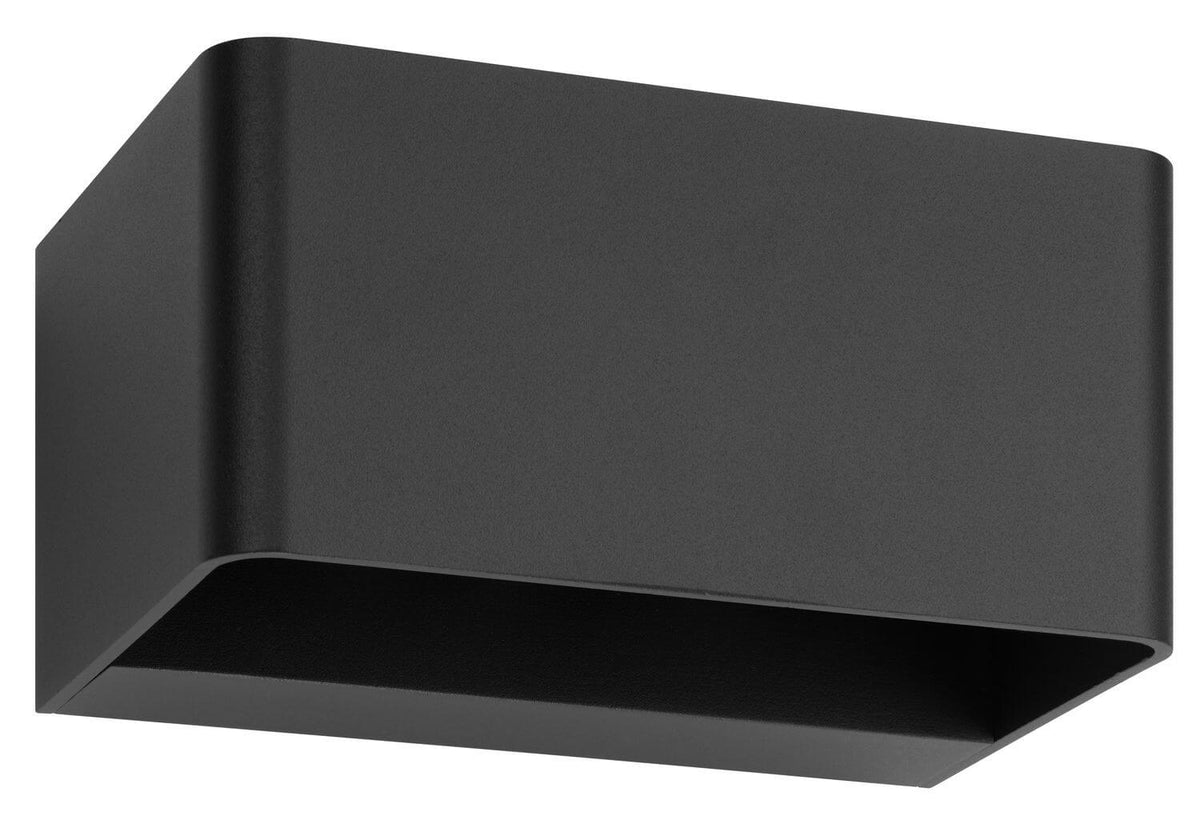 Autre angle du boîtier anthracite, mettant en valeur la face avant et l'ouverture basse.