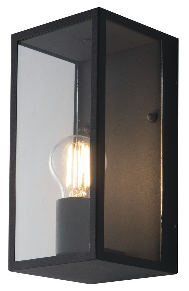 Vue en perspective du boîtier noir montrant le verre et l'ampoule Edison allumée