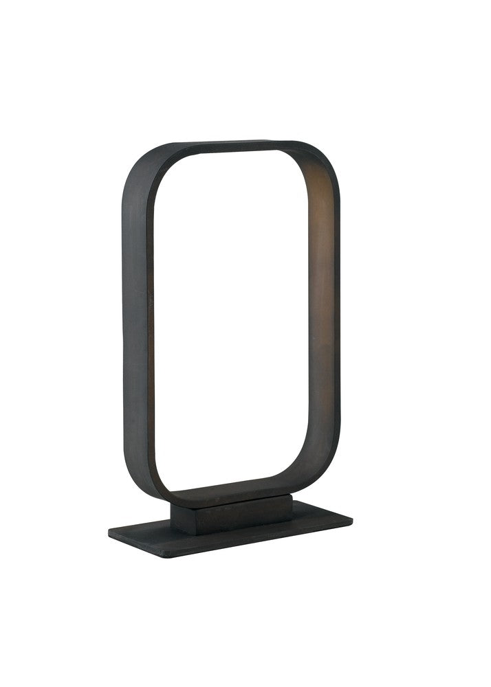 Vue de trois quarts montrant la base plate et l'anneau métallique finition bronze