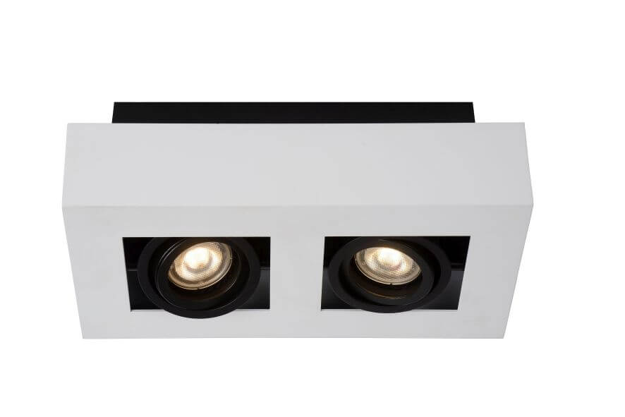 Vue en légère plongée du boîtier blanc et de son embase noire