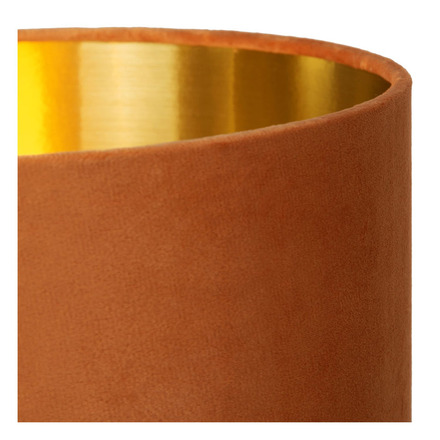 Détail du haut de l'abat-jour cylindrique avec intérieur doré réfléchissant.