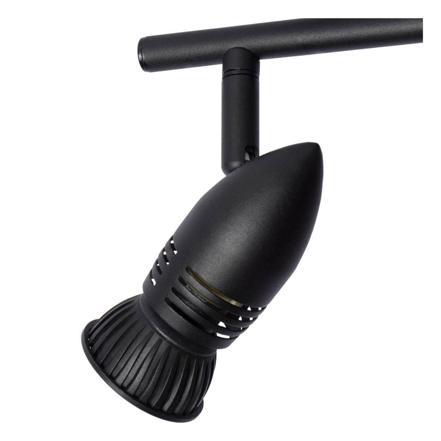 Gros plan en plongée sur une tête orientable à grille striée