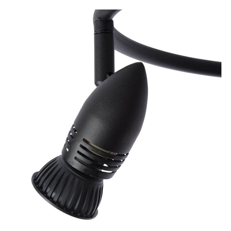 Détail d'une tête orientable en métal noir mat avec articulation et grille