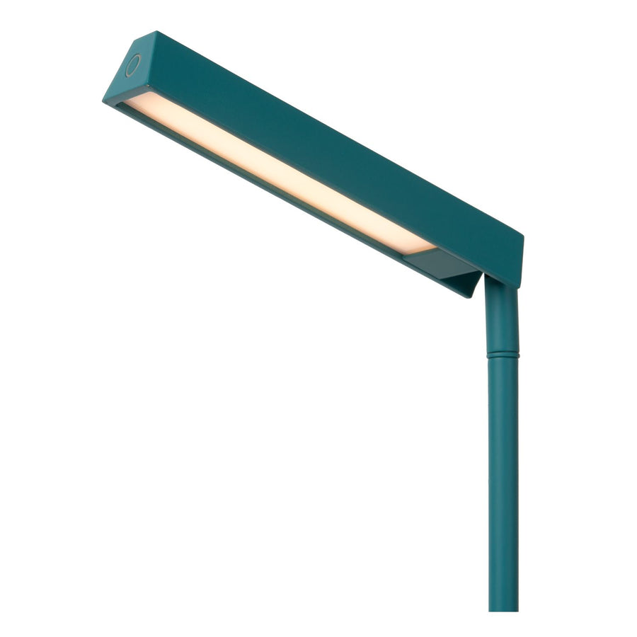 Détail de la tête rectangulaire allumée, diffuseur LED et tige turquoise.