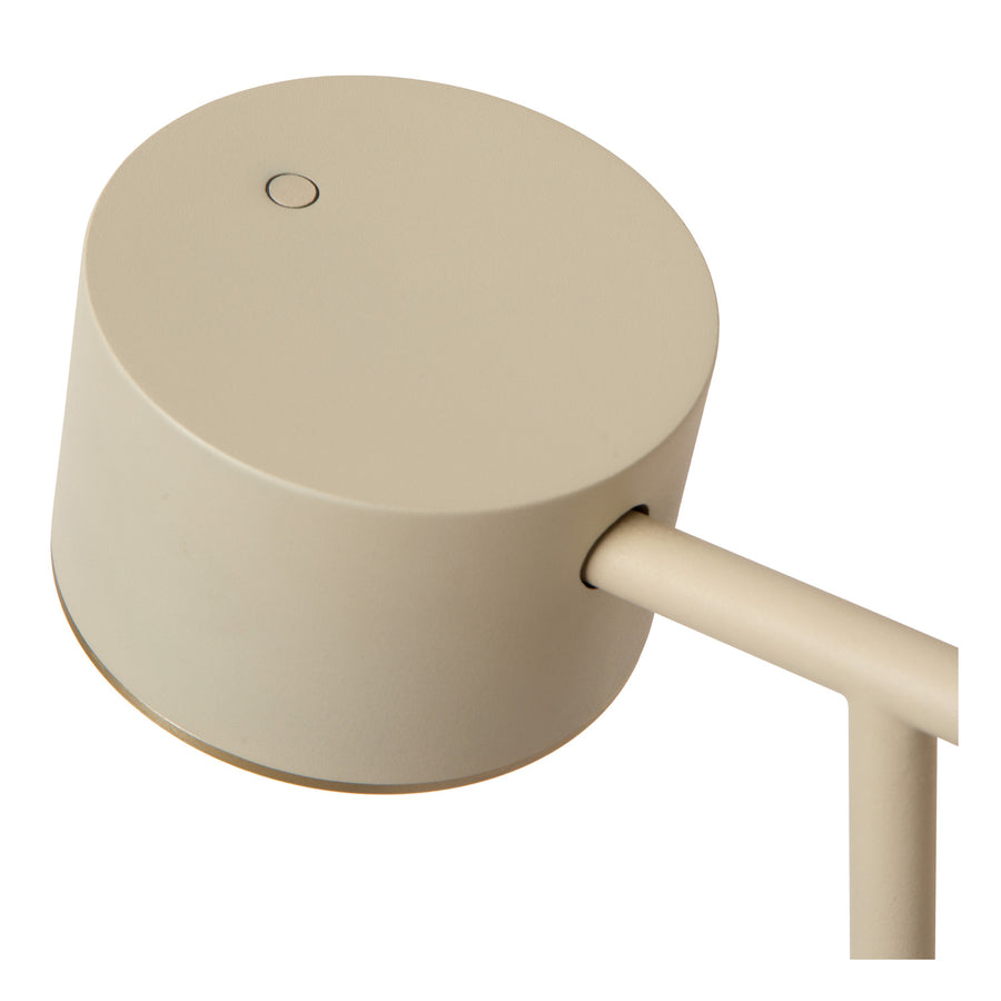 Gros plan sur le dessus de la tête cylindrique taupe avec petit bouton circulaire.
