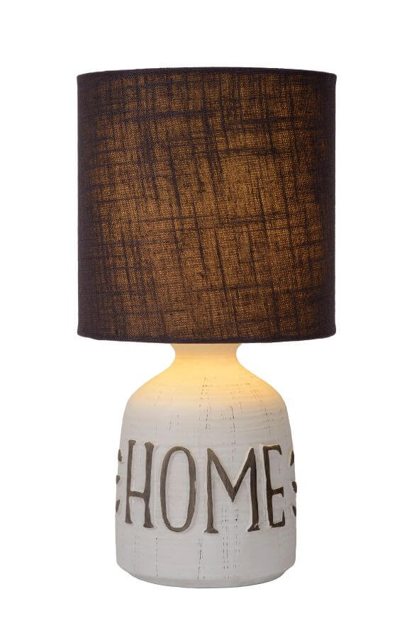 Vue de face sur fond blanc, lampe allumée avec abat-jour taupe.