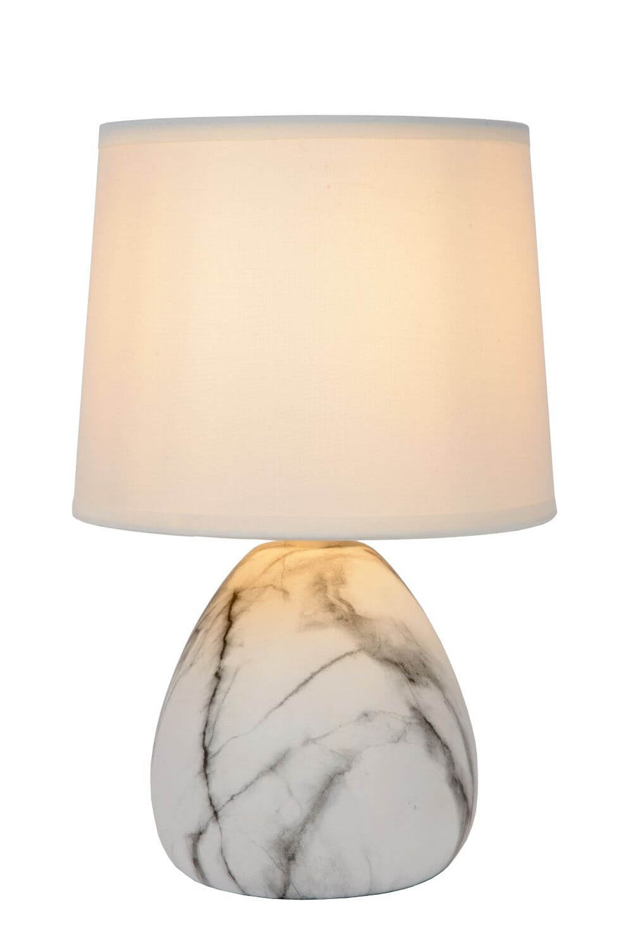 Lampe éclairée vue de face, lumière chaude traversant l abat-jour en lin