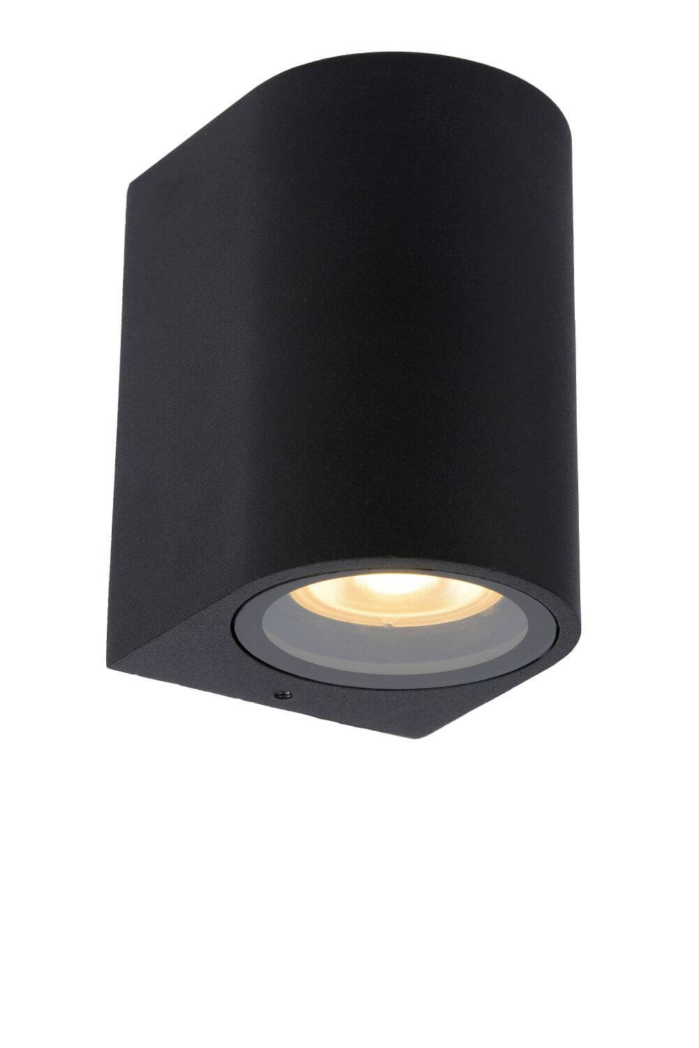 Gros plan du boîtier noir texturé, sortie de lumière ronde sous la face inclinée
