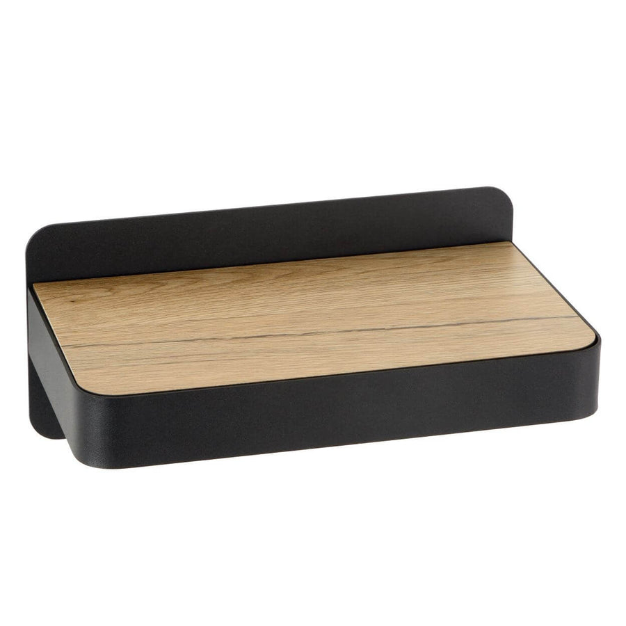 Vue de dessus montrant la tablette en bois clair posée sur le socle noir