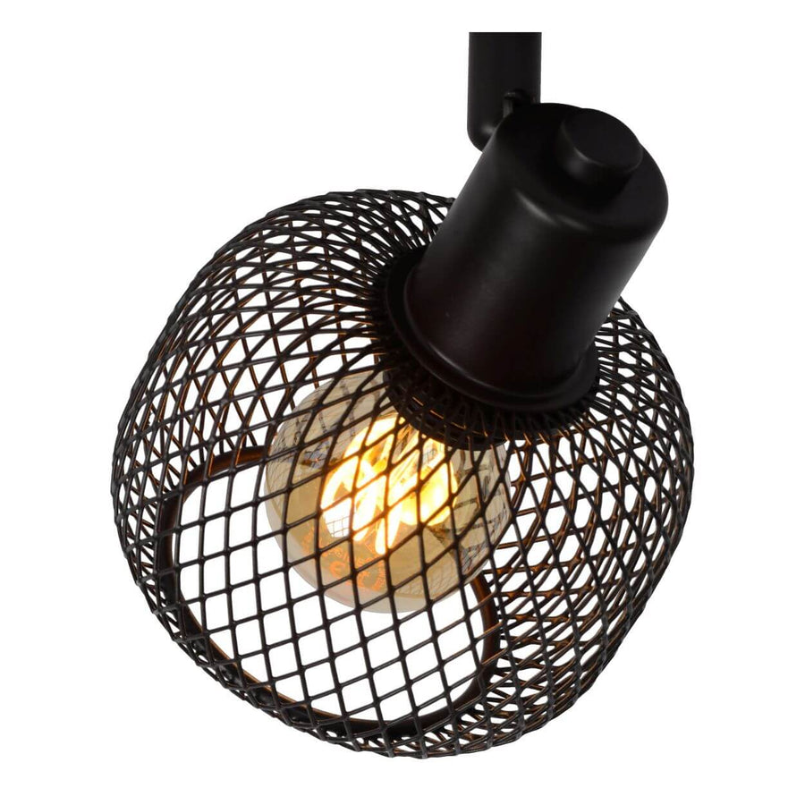Gros plan du produit : cage sphérique noire et ampoule à filament allumée