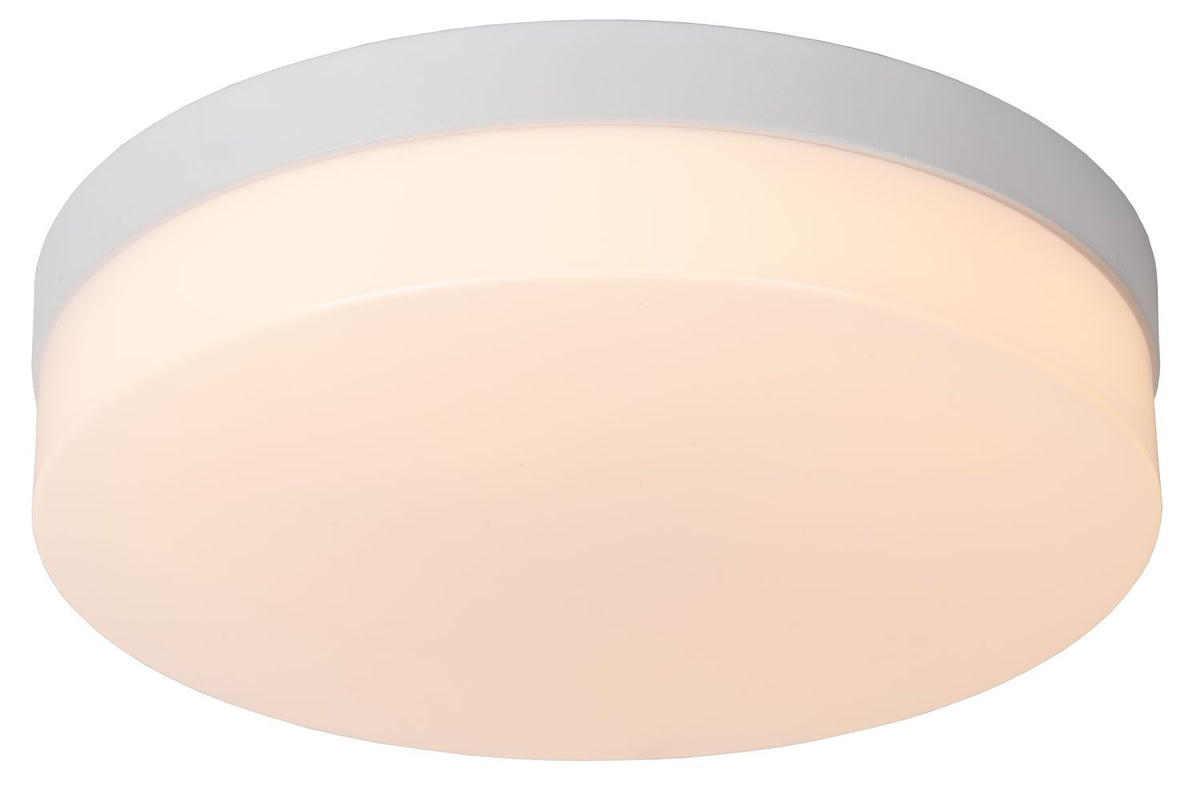 Vue en plongée du plafonnier rond blanc avec diffuseur lumineux allumé.