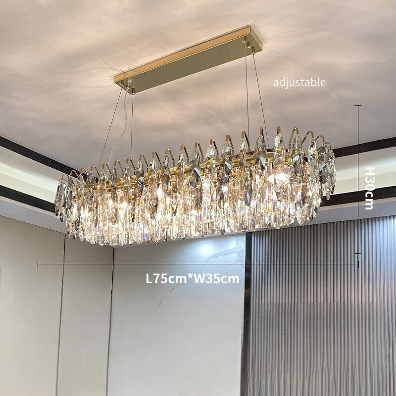 Lustre Cristal Moderne | Élégance Astrale | Designix - Lustre Ovale 75cm | 8 Ampoules Blanc Chaud  - https://designix.fr/