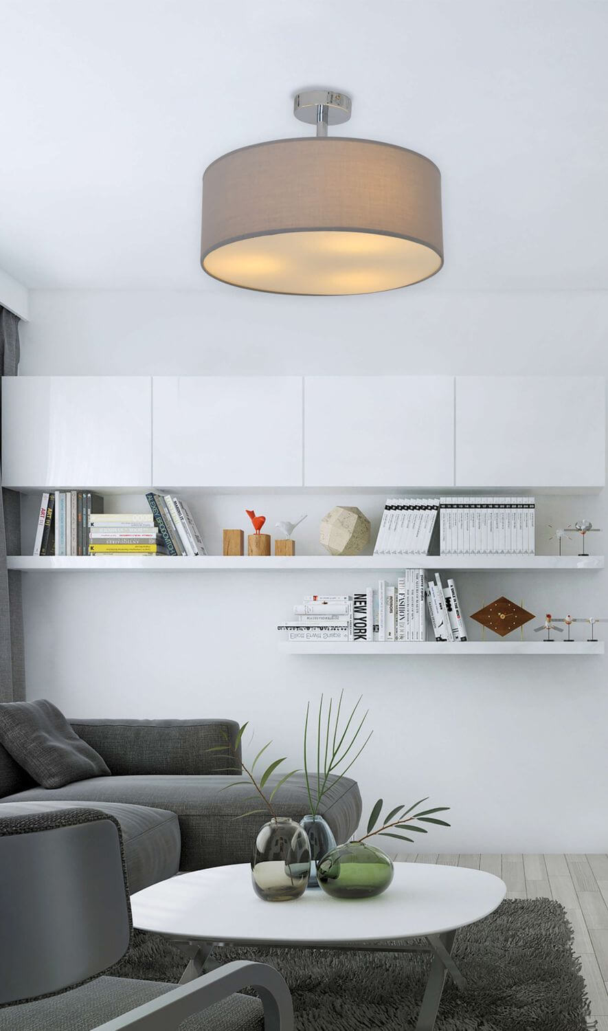 Luminaire allumé dans un salon moderne, étagères blanches et canapé gris