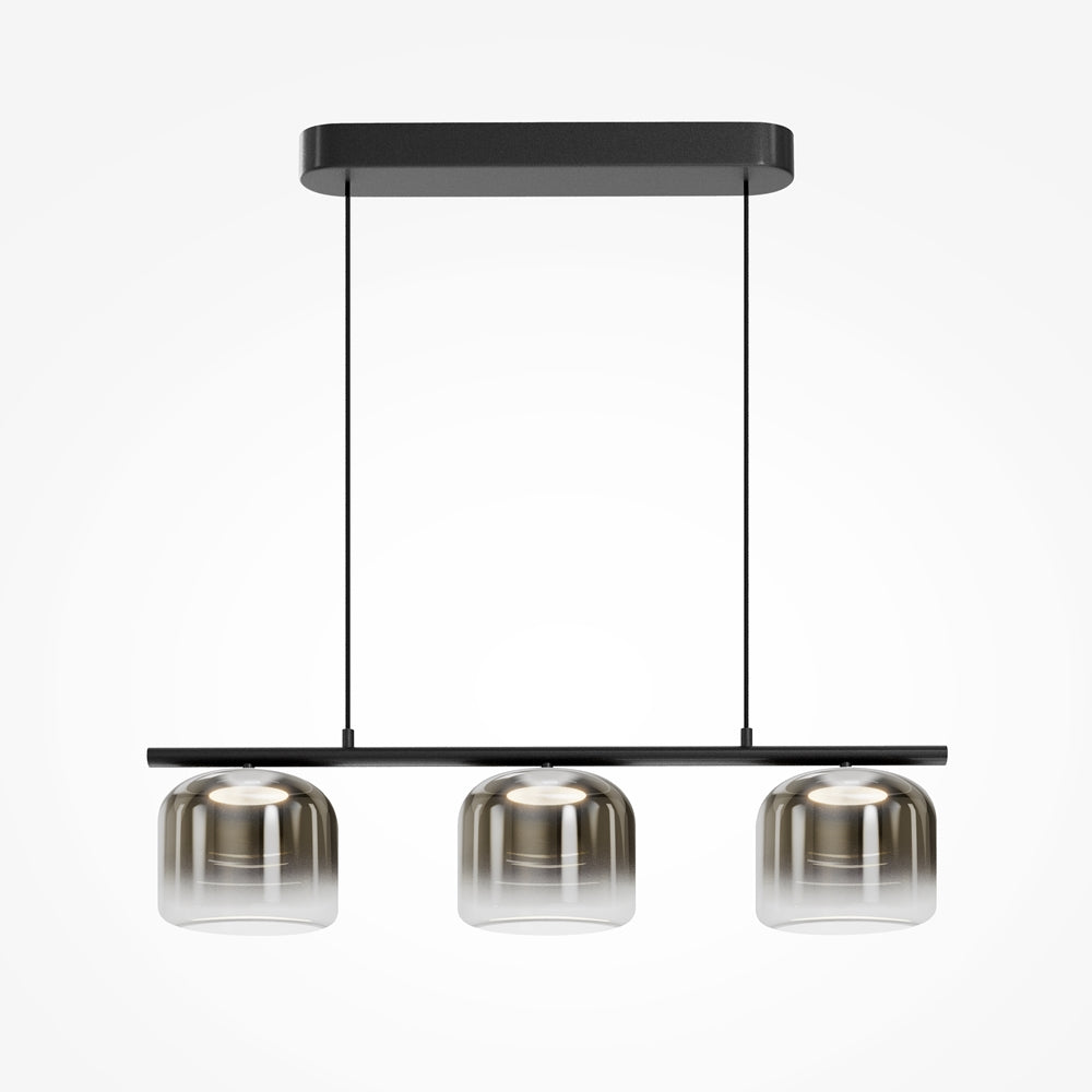 Suspension noire à trois abat-jours cylindriques en verre fumé dégradé.