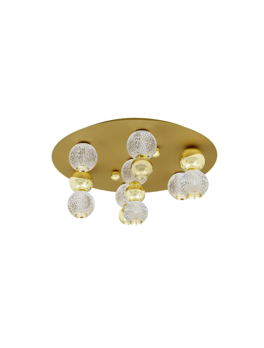 Produit isolé sur fond blanc, disque doré et globes de verre sphériques