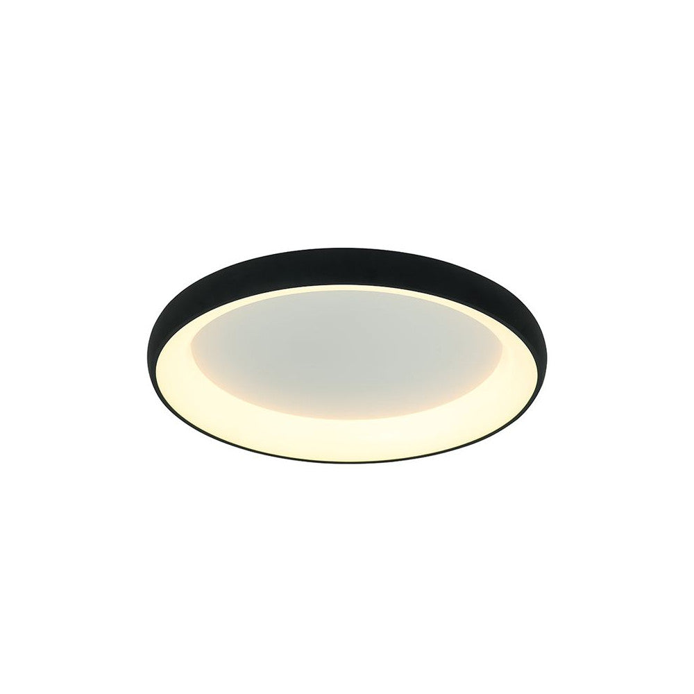 Vue de face du plafonnier rond noir avec grand diffuseur blanc allumé.
