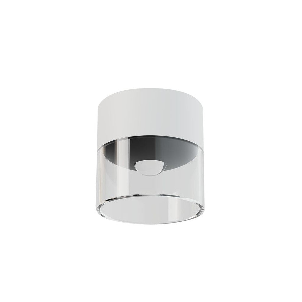 Plafonnier cylindrique blanc vu de face, diffuseur transparent laissant voir la source