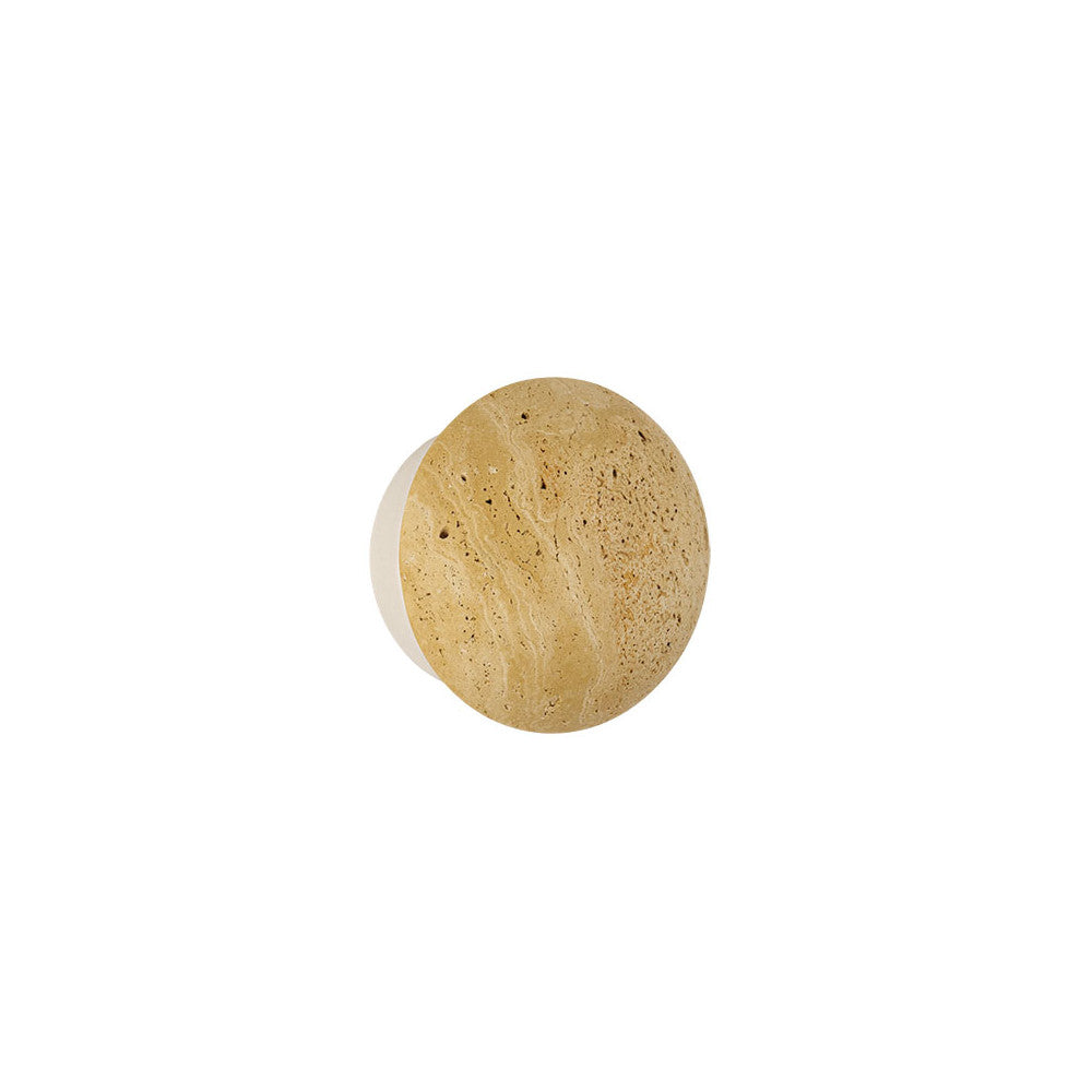 Vue de face de l'applique murale ronde en pierre naturelle beige.