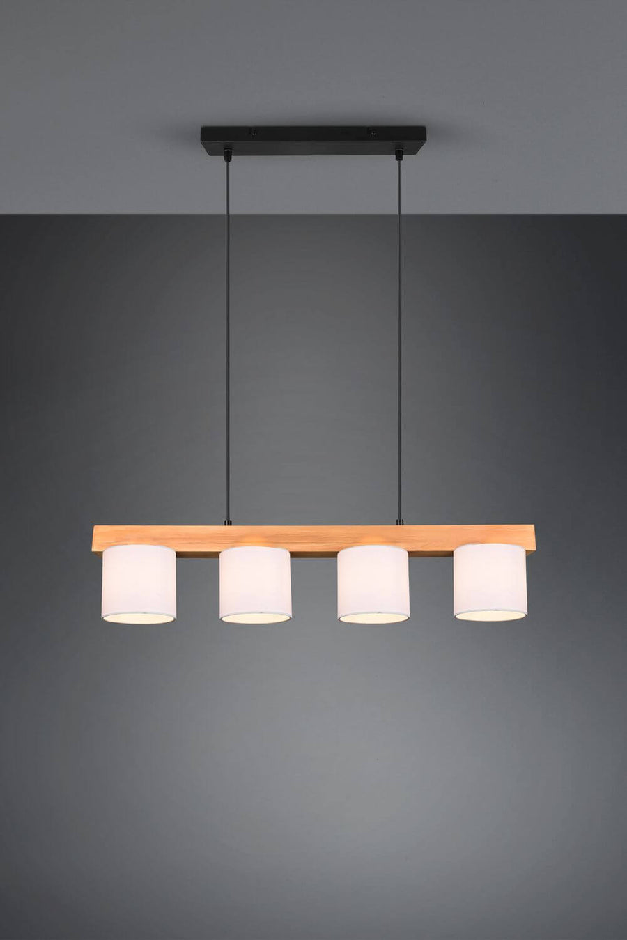 Vue de face détaillée de la suspension, poutre en bois et quatre cylindres blancs allumés.