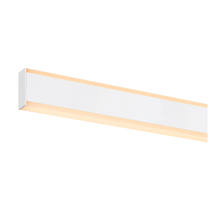 Vue en angle de la barre LED blanche, diffusant une lumière chaude continue.